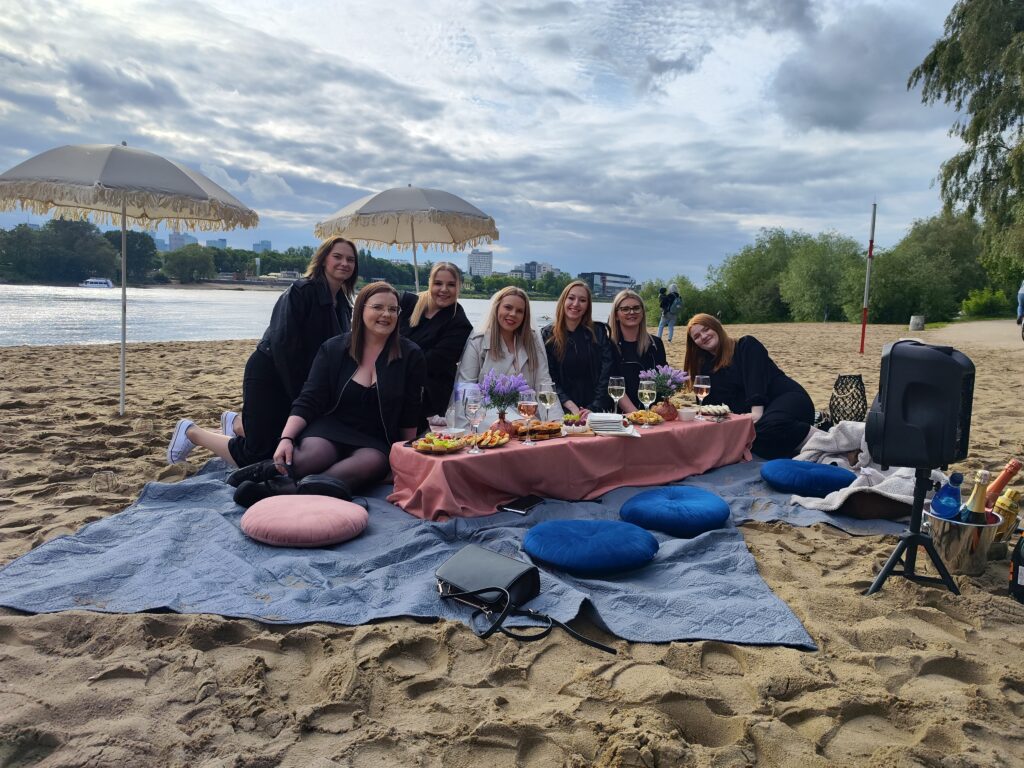 girls on the beach on hen party in warsaw dinner